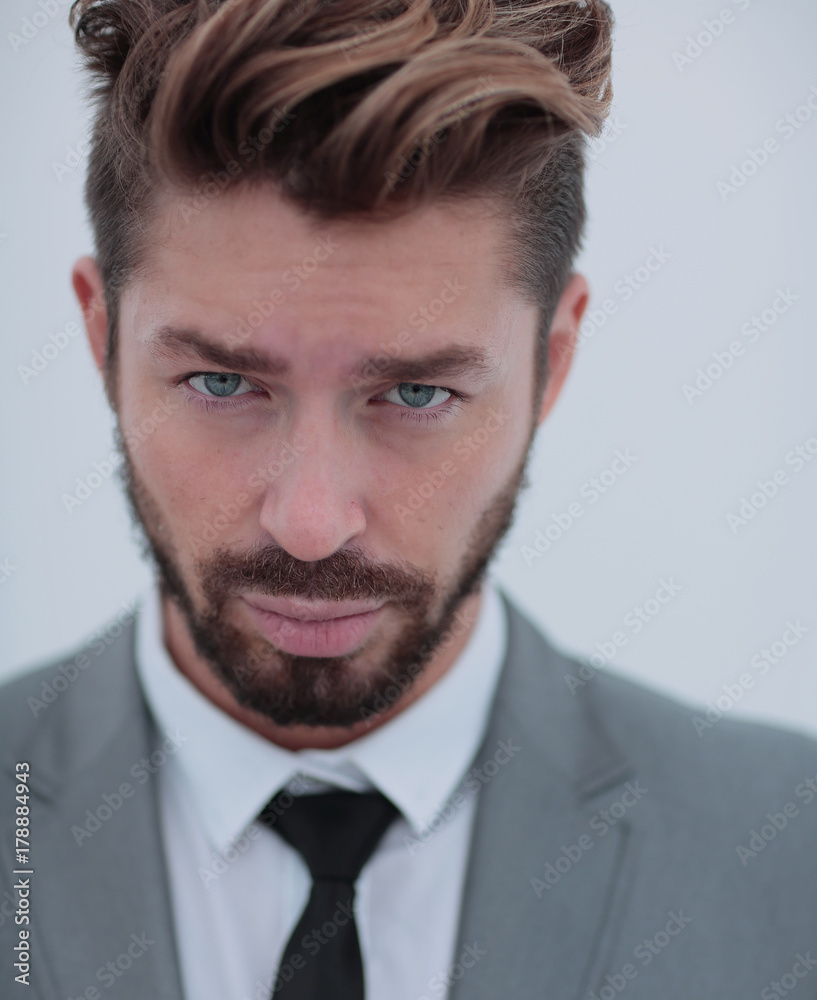 Close up portrait of a smiling handsome business man over white Close up portrait of a smiling handsome business man over white