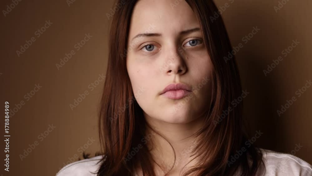 Surprised teen girl looking to a camera and making faces. Surprised teen girl looking to a camera and making faces.