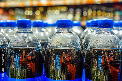 Many bottles with pepsi top view. background made by big pepsi bottles