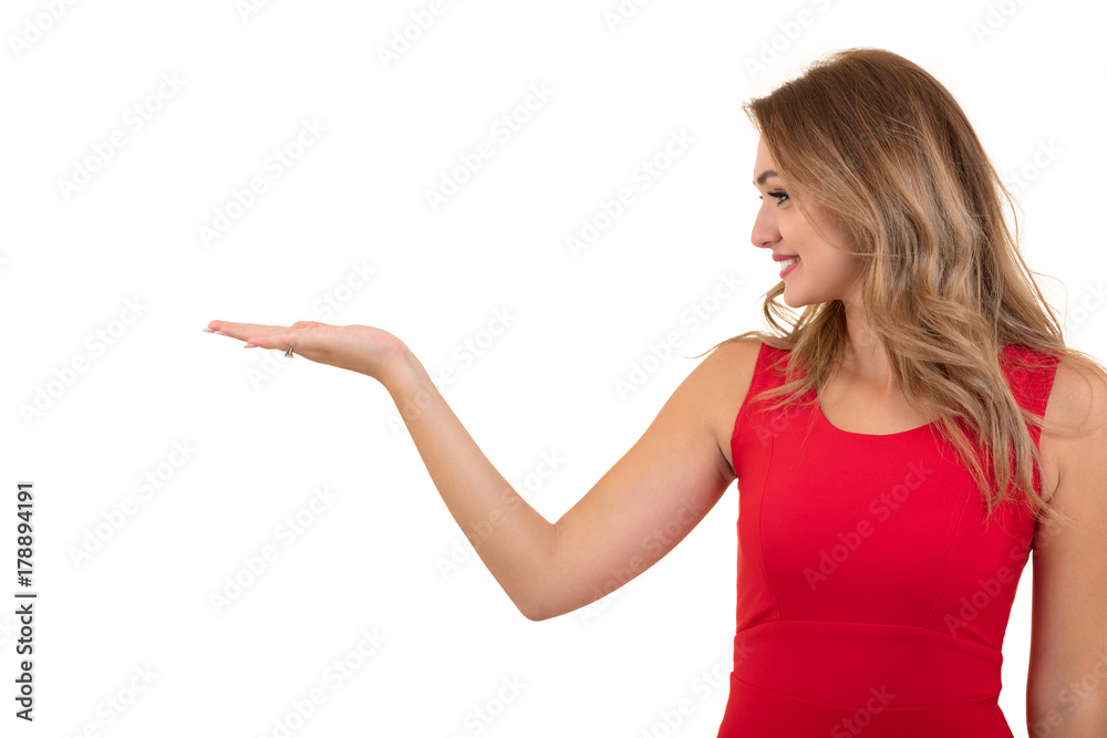 Woman pointing at sign. Young beautiful sexy woman showing copy space on empty blank sign or gift card. Woman pointing at sign. Young beautiful sexy woman showing copy space on empty blank sign or gift card.