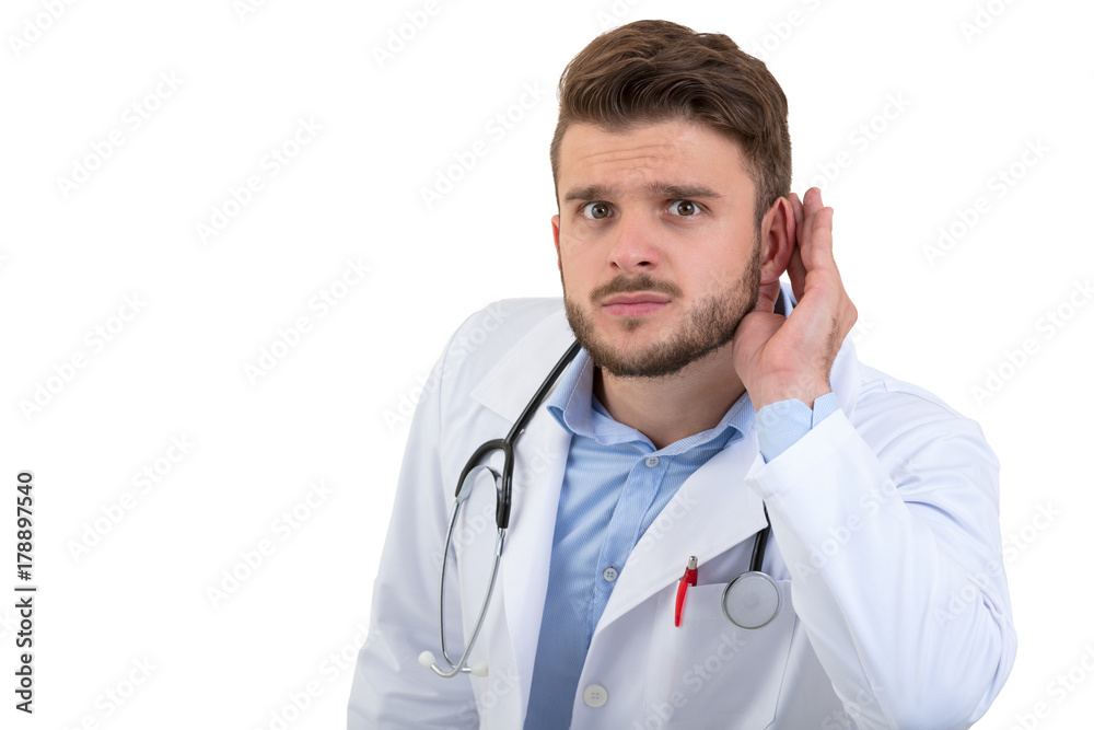 A handsome doctor gesturing silence with his finger over his mouth isolated on white background A handsome doctor gesturing silence with his finger over his mouth isolated on white background