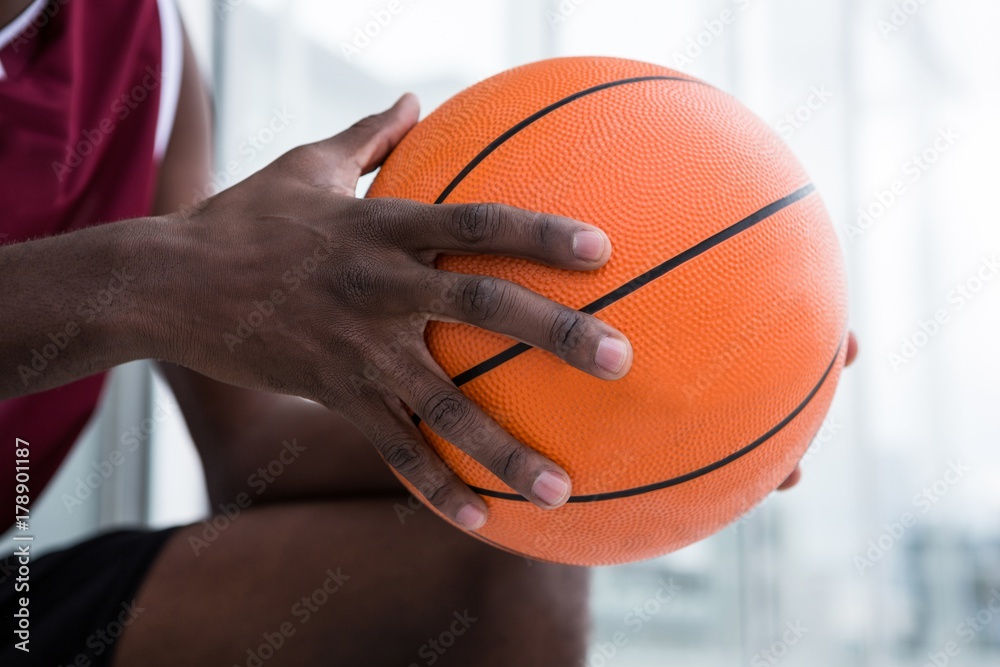 Player holding basketball