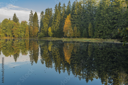 Kladska pond with rebound in water in autumn morning