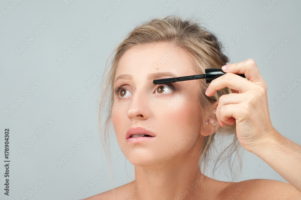 Beauty makeup and cosmetics. Mascara brush Beauty makeup and cosmetics. Mascara brush