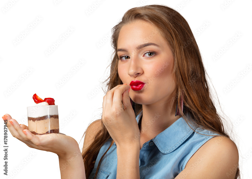Cute attractive young woman standing and holding cup dessert Cute attractive young woman standing and holding cup dessert