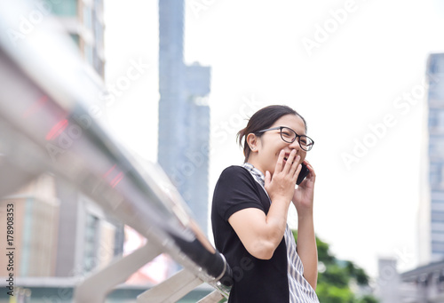 Chinese Business Woman talking business. © eggeeggjiew