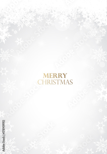 Christmas light background with white snowflakes and golden Merry Christmas text - light version