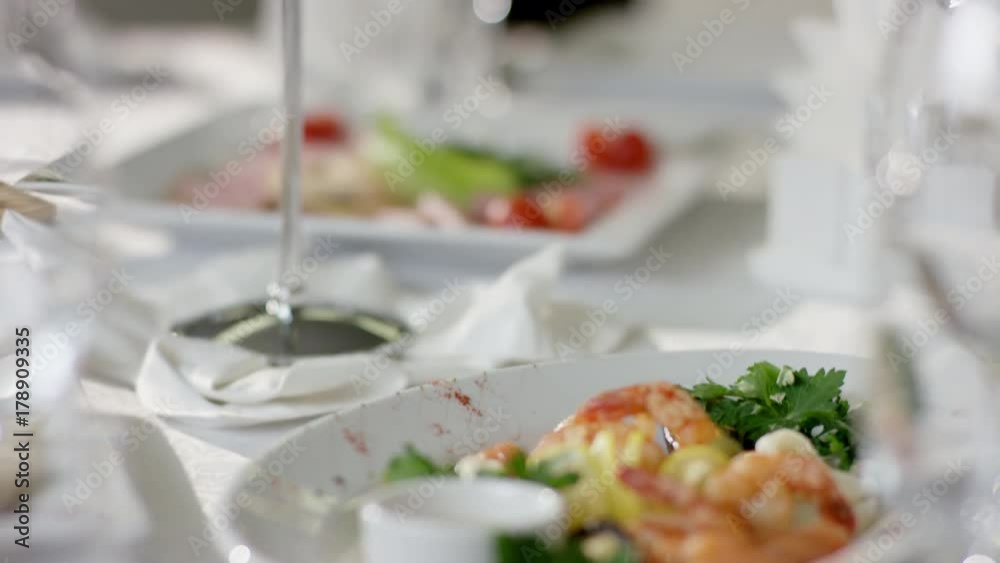 View of beautiful shrimp dish on dinner table at restaurant View of beautiful shrimp dish on dinner table at restaurant