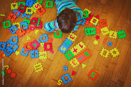 little boy learning numbers, education concept