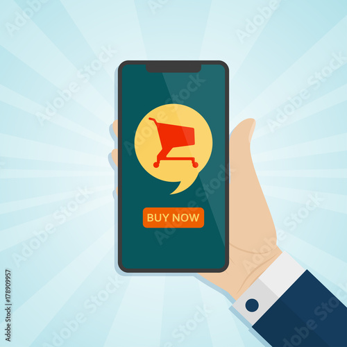 Hand holding smartphone with shopping cart on a screen. Vector illustration.