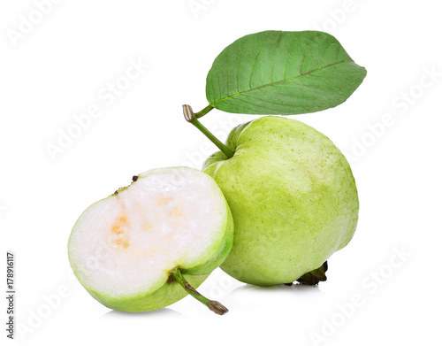 whole and half guava fruit with green leaf isolated on white background