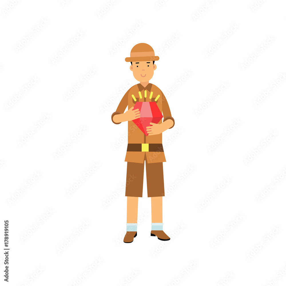 Young archaeologist character standing with red jewel in hands
