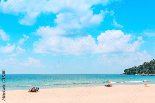 Ka-ron Beach at Phuket , Thailand. White sand beach with beach umbrella. Summer, Travel, Vacation and Holiday concept.