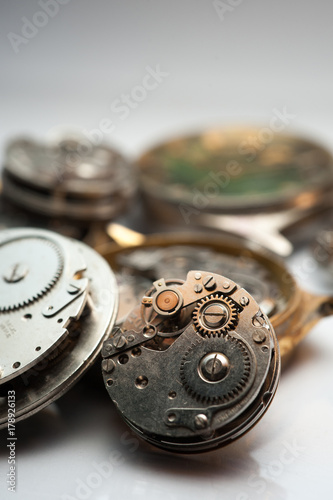 Detail of watch machinery on the table. 