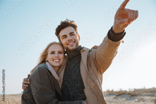 smiling embracing couple