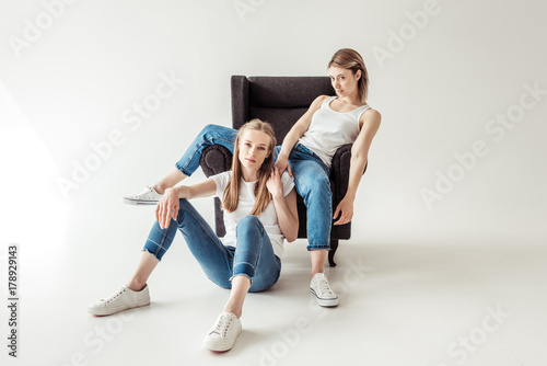 Lesbian couple on armchair
