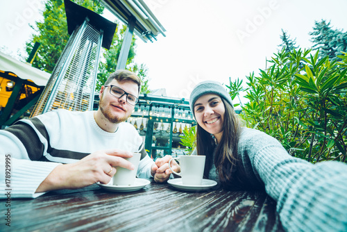 couple eating in cafe outside photo