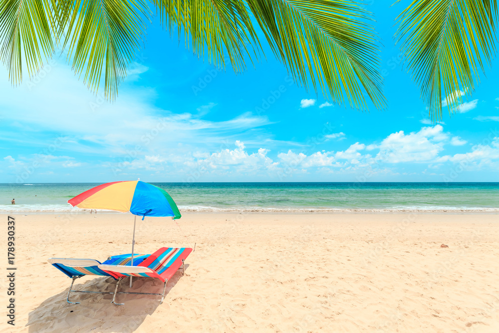 Ka-ron Beach at Phuket , Thailand. White sand beach with beach umbrella. Summer, Travel, Vacation and Holiday concept.