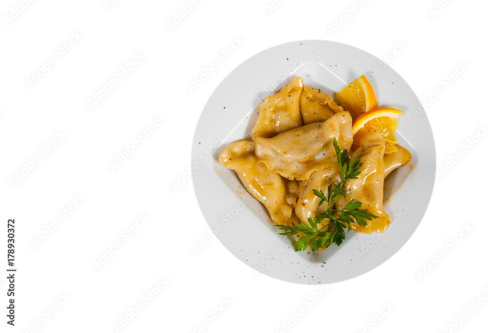 sweet ravioli on white plate. with copy space. top view. isolated on white sweet ravioli on white plate. with copy space. top view. isolated on white