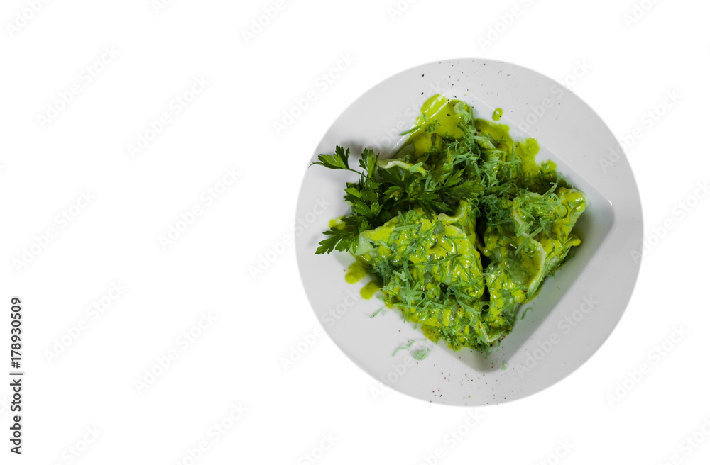 Green ravioli with spinach. with copy space. top view. isolated on white Green ravioli with spinach. with copy space. top view. isolated on white