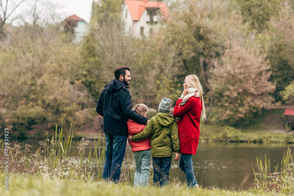 young family near lake