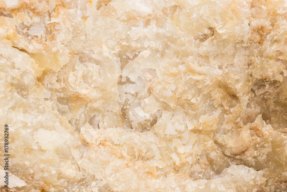 Lightened slices marble onyx. Horizontal image. Warm calm colors. Beautiful close up background, onyx marble texture. Lightened slices marble onyx. Horizontal image. Warm calm colors. Beautiful close up background, onyx marble texture.