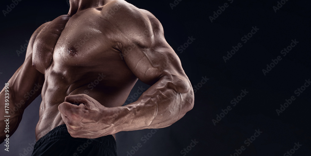 man bodybuilder showing muscular body man bodybuilder showing muscular body