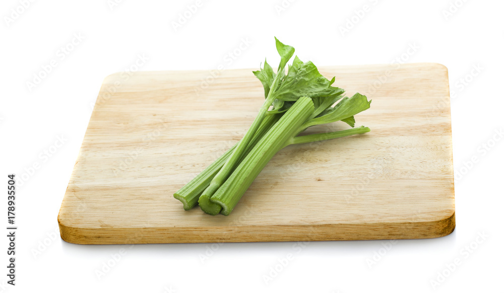 Fresh celery stalks on a white background Fresh celery stalks on a white background