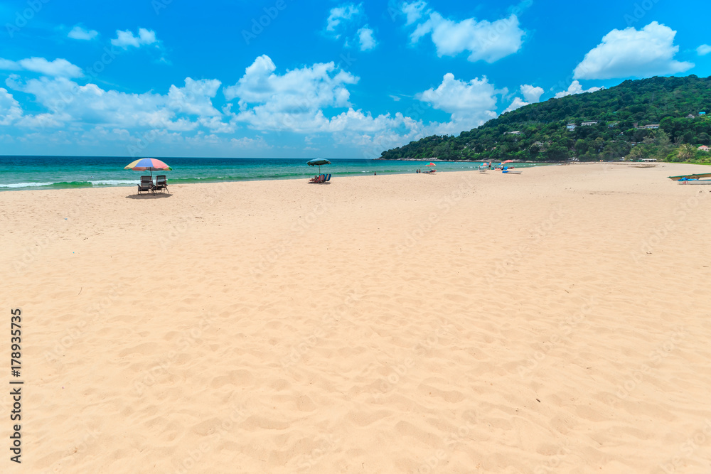 Ka-ron Beach at Phuket , Thailand. White sand beach with beach umbrella. Summer, Travel, Vacation and Holiday concept. Ka-ron Beach at Phuket , Thailand. White sand beach with beach umbrella. Summer, Travel, Vacation and Holiday concept.