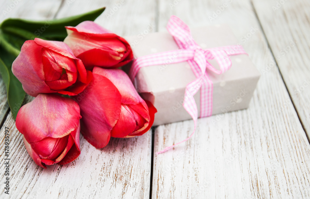 Spring tulips flowers and gift box Spring tulips flowers and gift box