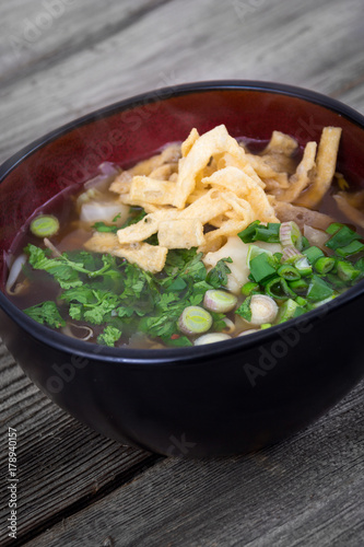 asian soup topped with wonton strips