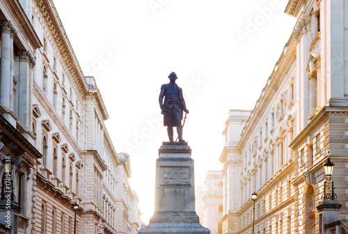 Photography The sun rises behind a statue of Robert Clive at the Churchill War Rooms