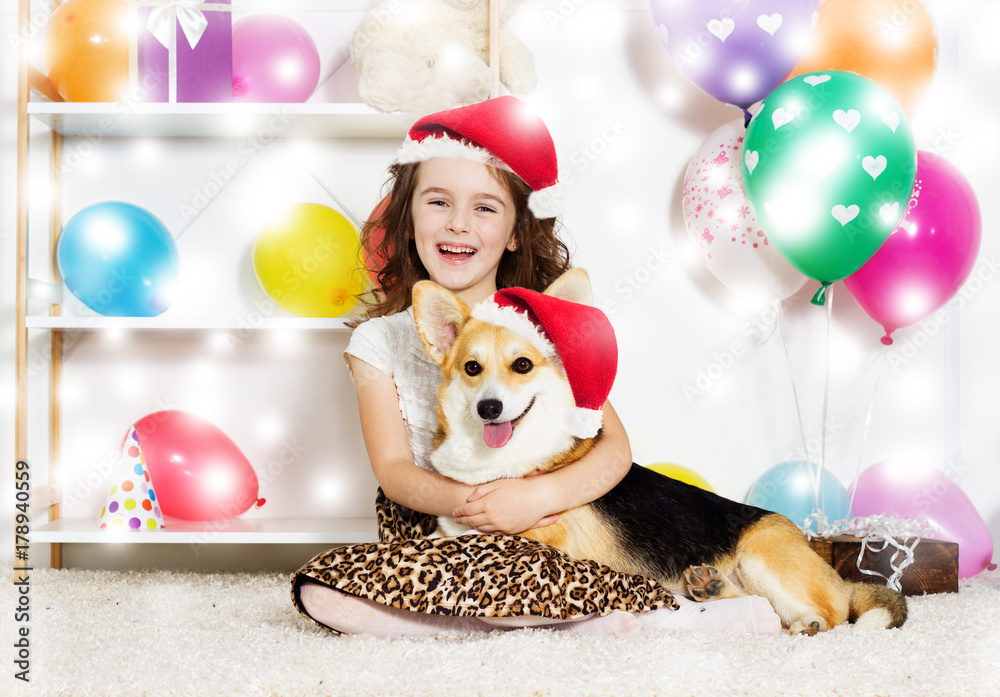 Fototapeta premium child and dog new year and Christmas holidays