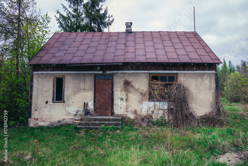 Old ruined cottage in vilage located in Kampinos Forest near Warsaw in Poland