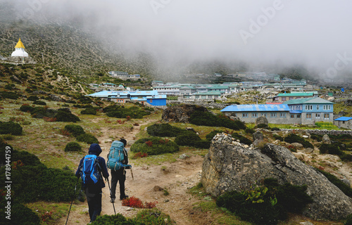 Two Trekkers Walking to Dingboche Village, Everest Base Camp Trek From Tengboche to Dingboche , Nepal
