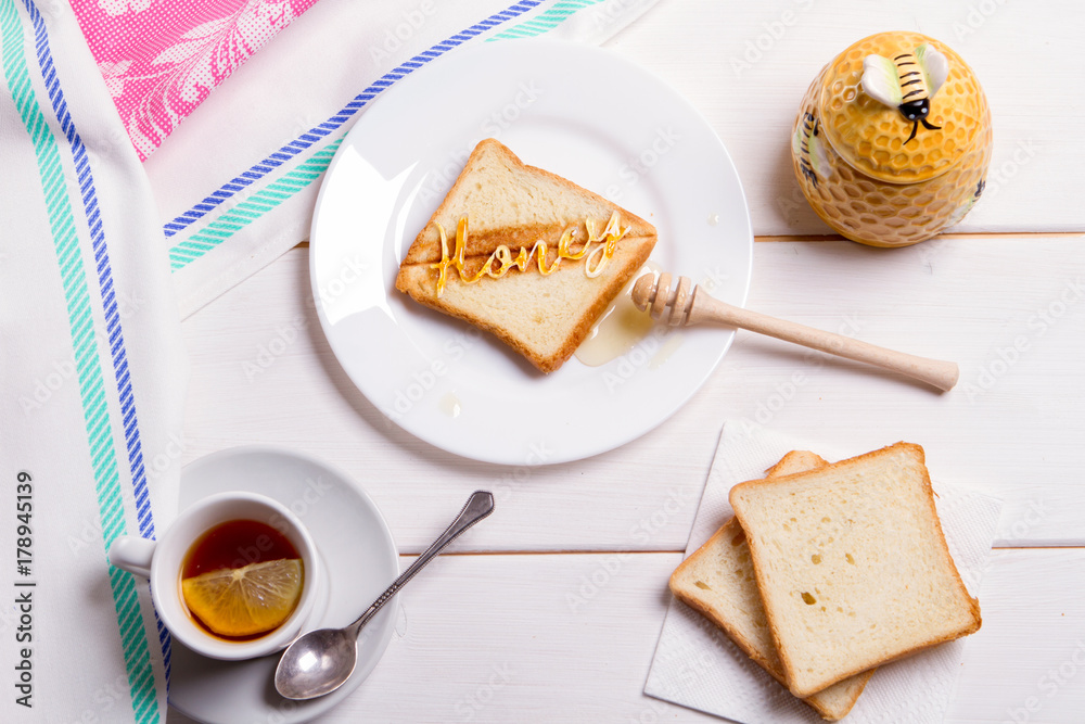 BREAKFAST CONCEPT fried bread toast with honey BREAKFAST CONCEPT fried bread toast with honey