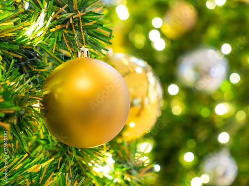 Golden Christmas ball on Christmas tree 2