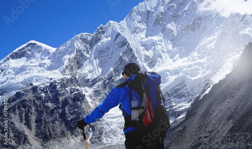 Trekker Standing In The Front of Pumori Mount, Everest Base Camp Trek, Nepal photo
