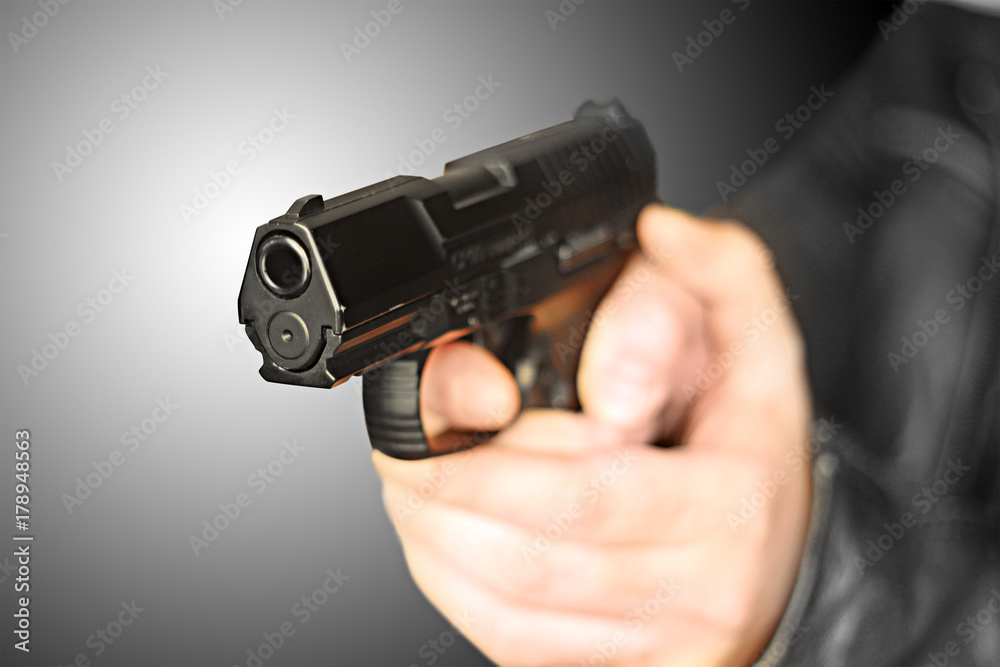 man with hand gun pistol rubber attack violence man with hand gun pistol rubber attack violence