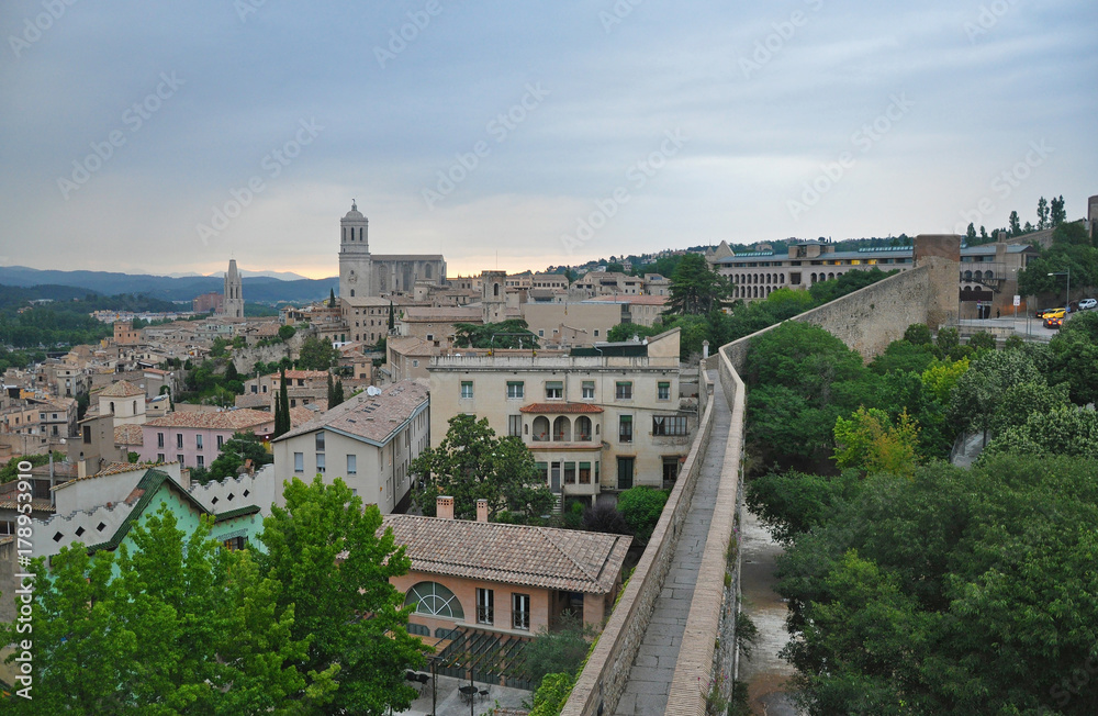 Evening panorama of the Spanish city of Girona and Сathedral church