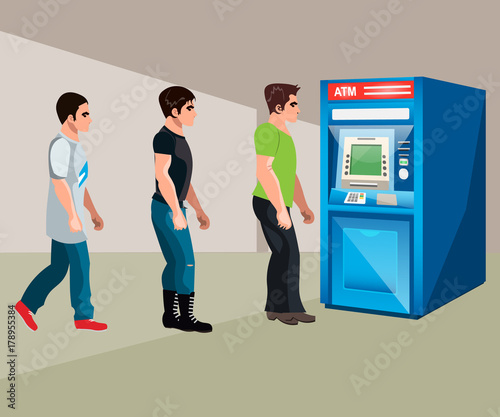 People stand at the cash machine.