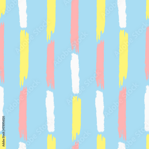 Vertical stripes painted with brush strokes. Cute seamless pattern. Grunge, sketch, watercolor.