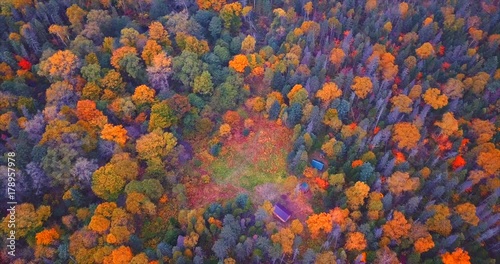 Top spinning aerial view of lonely ranger house among the endless forests of Sikhote-Alin Nature biosphere Reserve in Russia for the endangered Siberian tiger founded in 1935 photo