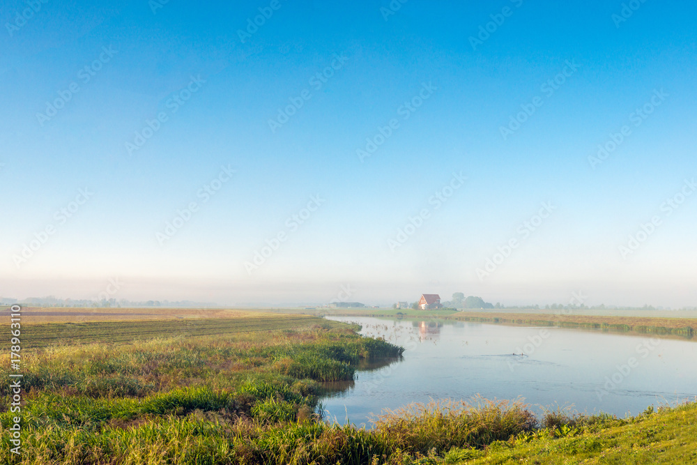 Colorful Dutch polder landscape early in the morning