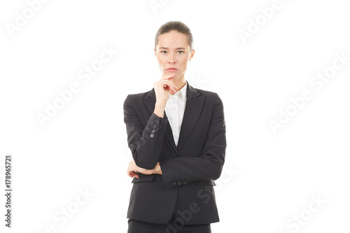 Portrait of young emotional businesswoman in formal suit on white background