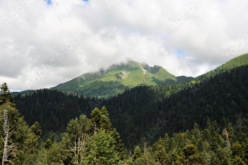 mountain landscape - the clouds hanging over the Caucasus mountains