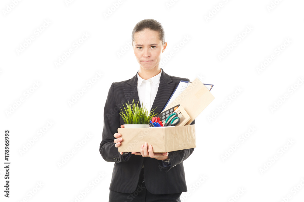 Portrait of female employee holding box with belongings Portrait of female employee holding box with belongings