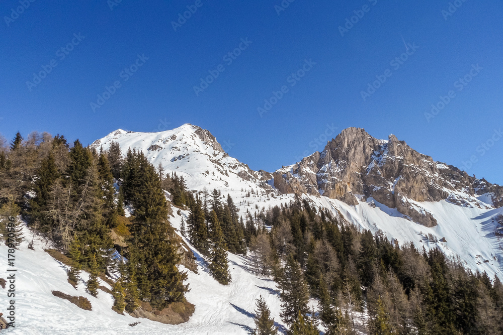 Skiing and snowboarding on the mountain of Les arcs, France.