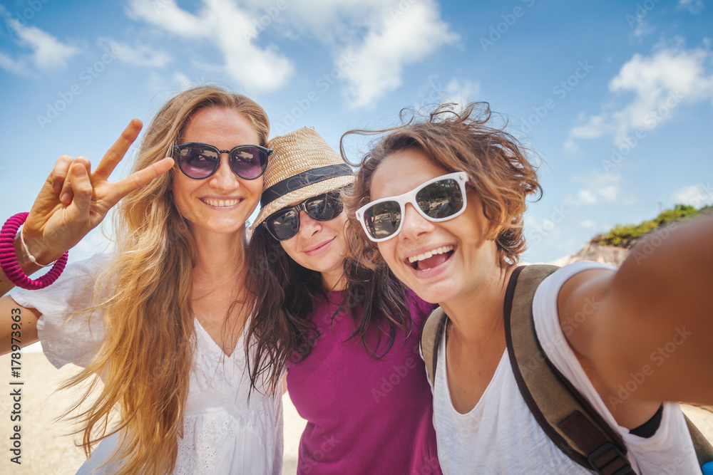 Young beautiful woman doing selfie on the beach. Friendship, freedom, travel. Young beautiful woman doing selfie on the beach. Friendship, freedom, travel.