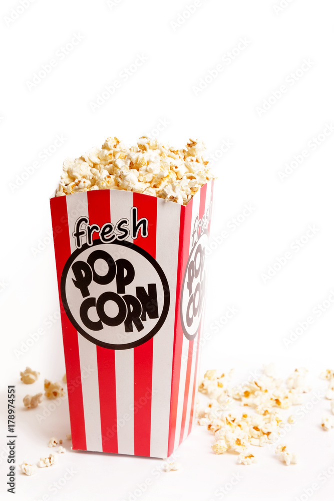 Box of fresh popcorn on white background